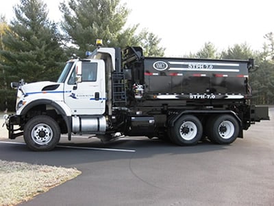 Stph Hook Mounted Patch Truck – Oil Jacketed Auger Discharge - Stringfellow Inc.
